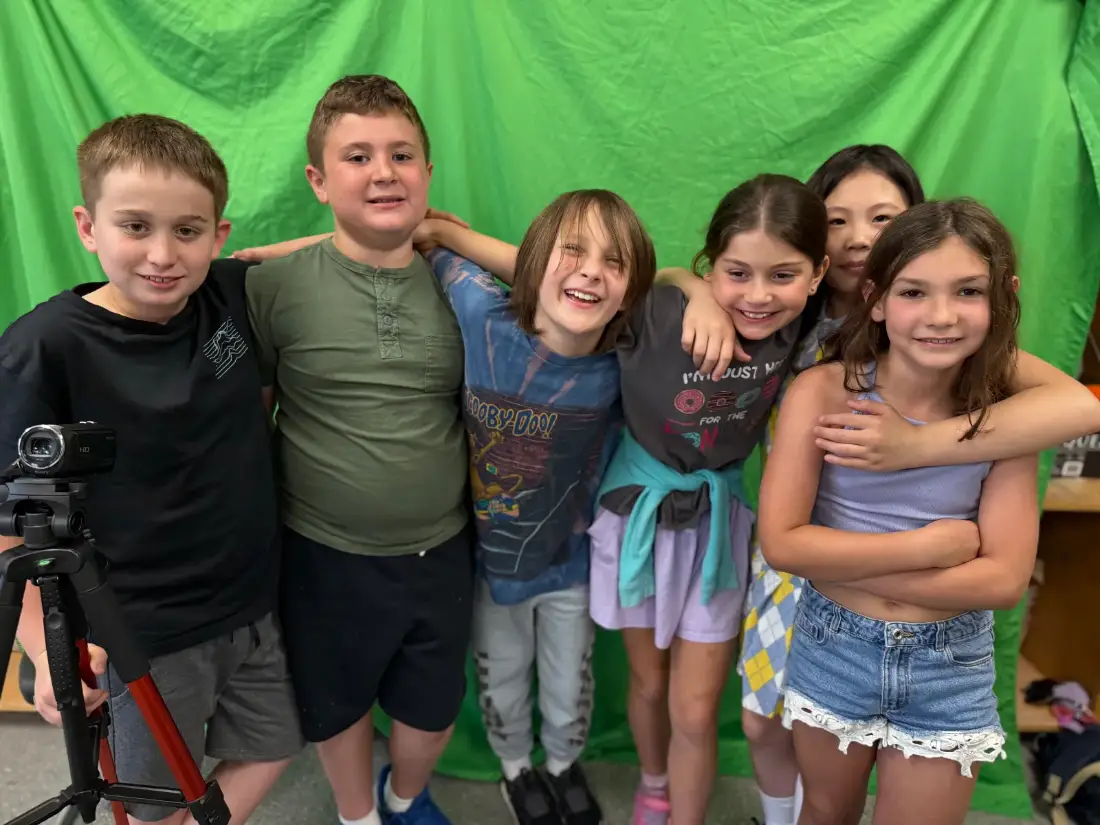 An after-school film class for kids in Los Angeles, mid-session on set