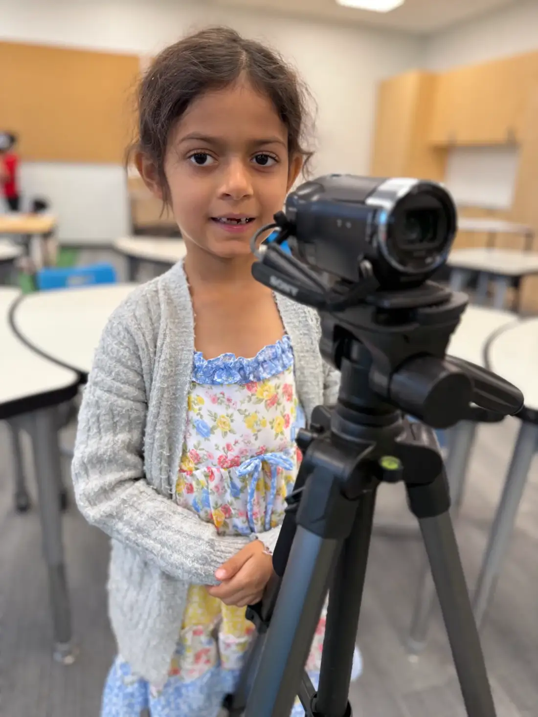 A camper lining up her shot on the tripod