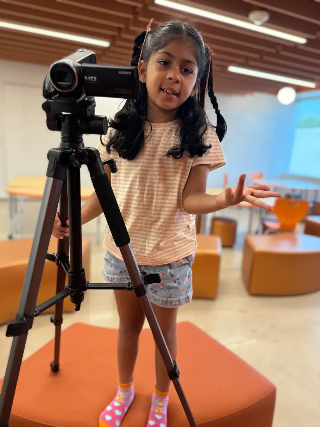 A camper lining up her shot on the tripod